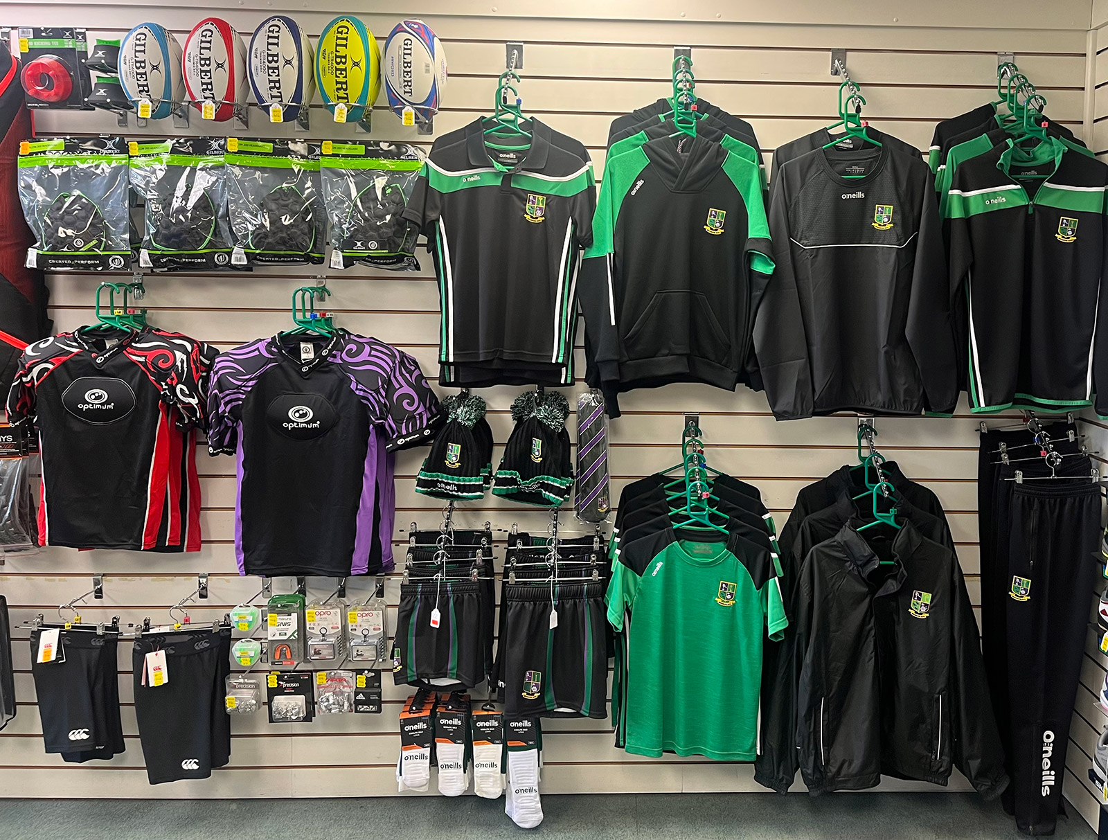 Rugby balls and team clothing. Winners Sports and supplies